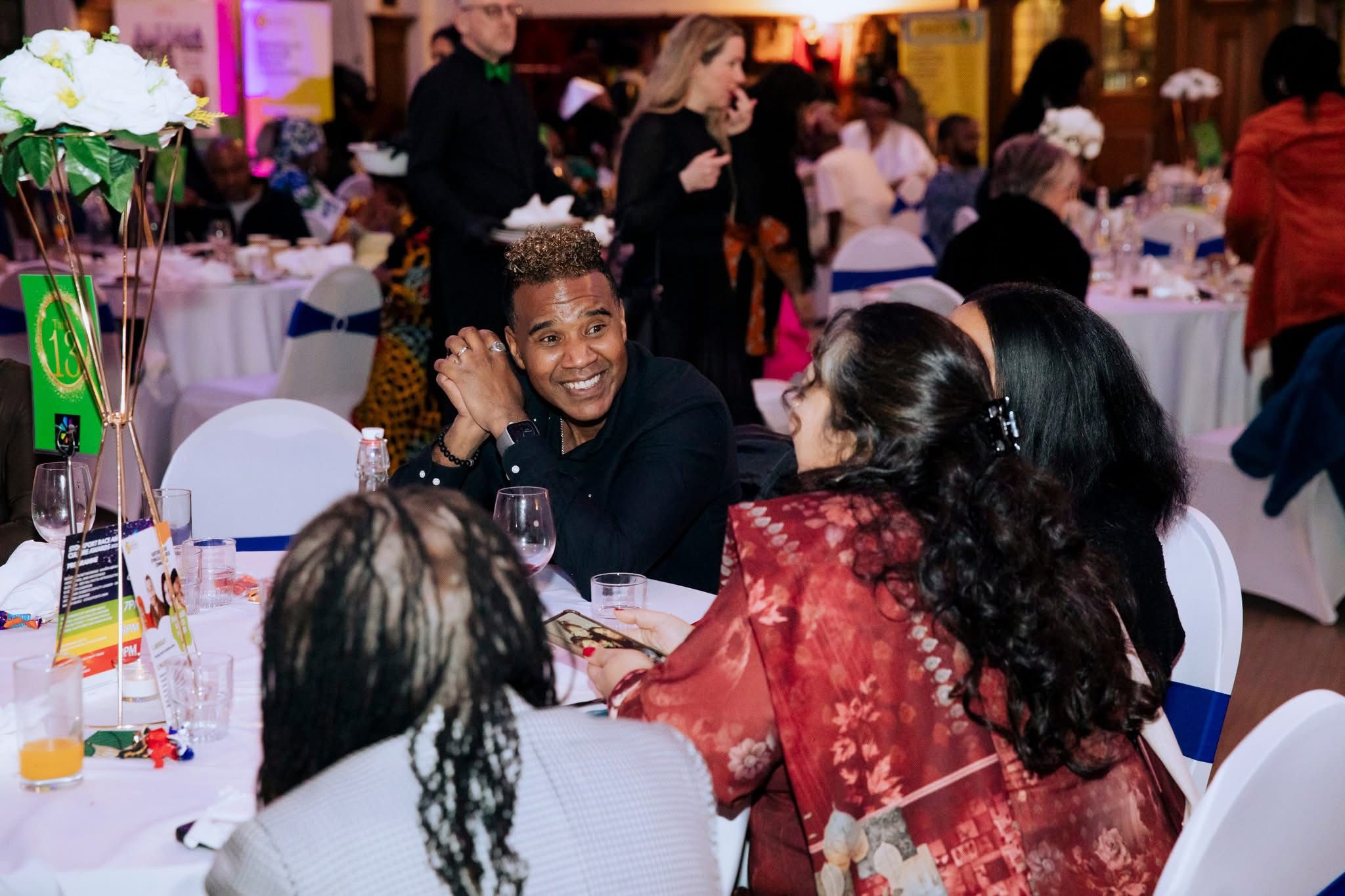 Guests sharing a joyful moment at the SRACA gala